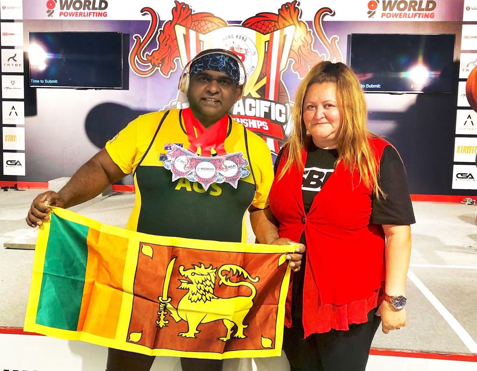 Dr. Ruwan Paul - World Powerlifting Champion with Sri Lanka National Flag