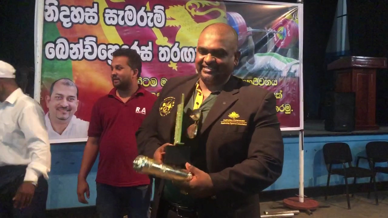 Dr. Ruwan Paul Receiving National Strength Trophy